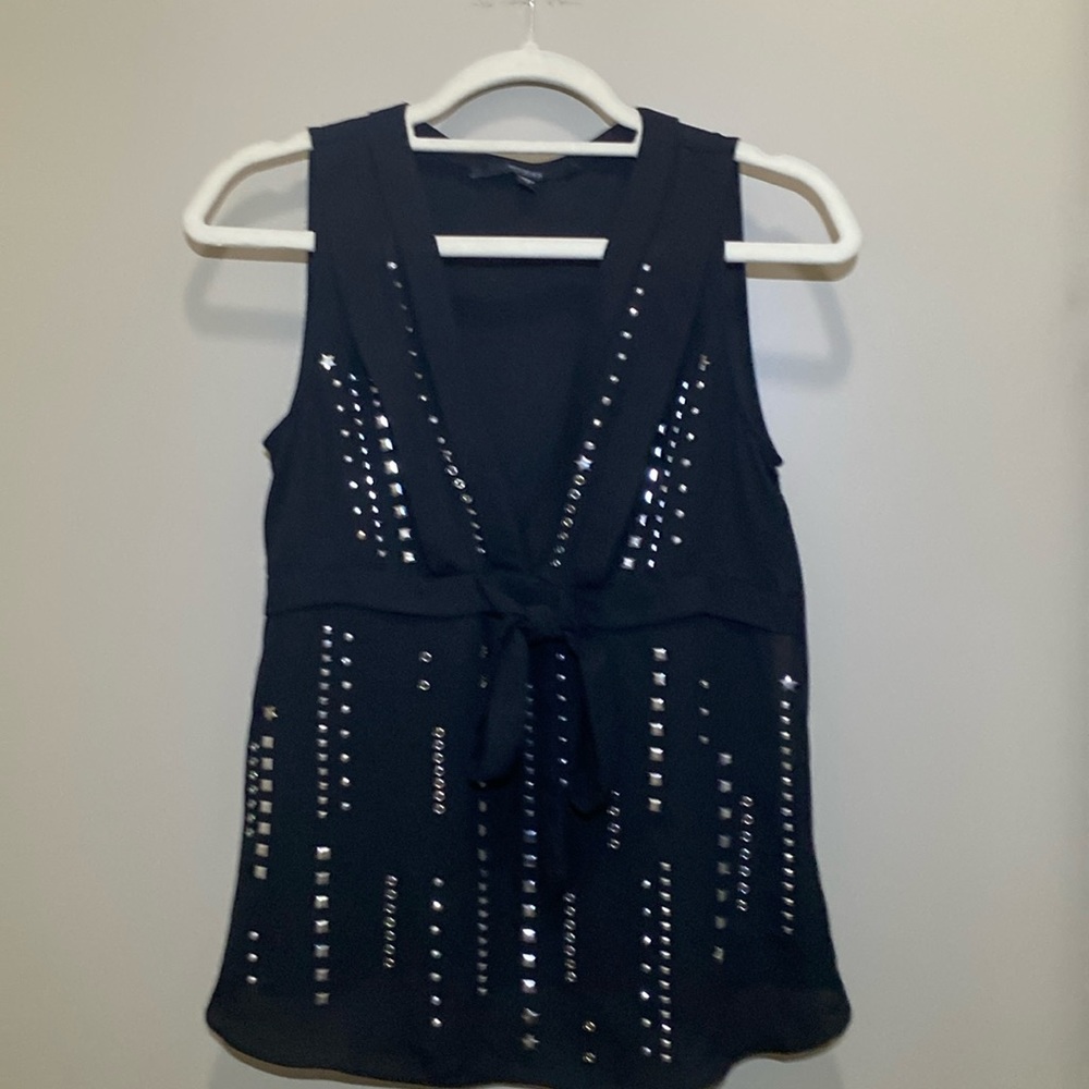 Stylish black top from Guess. Size is Small